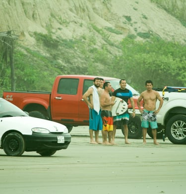 Group of friends talking after the surf session