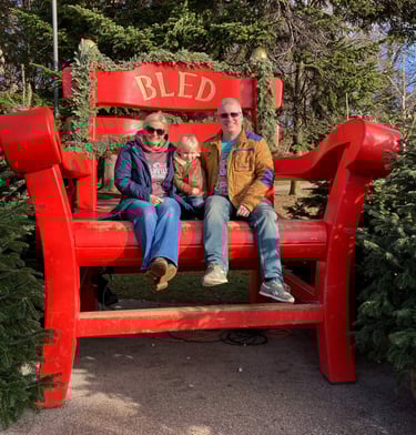 Family on Lake Bled Christmas markets photo prop