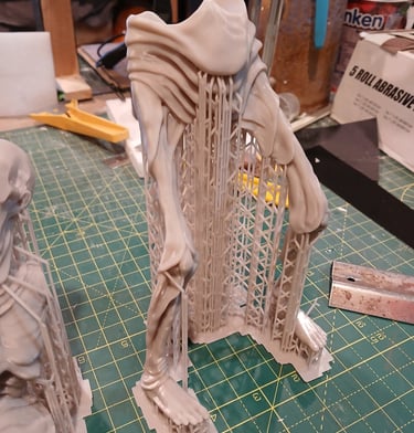 Resin 3D printed character parts with support structures prior to cleaning and finishing