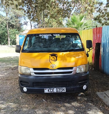 Yellow school van for Duma School from Vanna Ventures