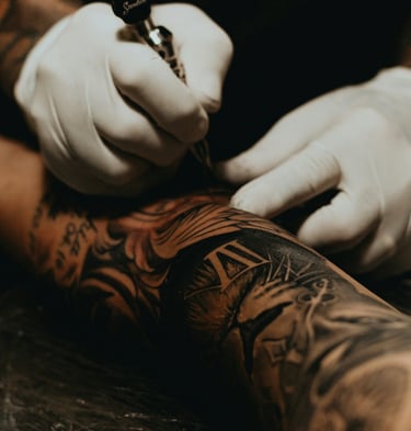 A person with a tattoo on their arm