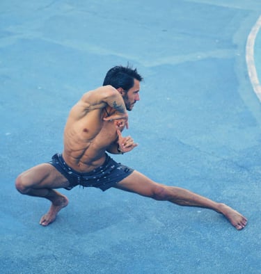a man is doing a yoga pose from movement snacks online course