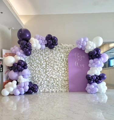Born to win themed balloon backdrop paired with our white rose flower wall