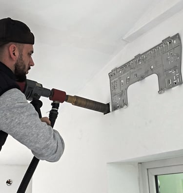 Traversée murale par carottage d'un mur pour unité de clim