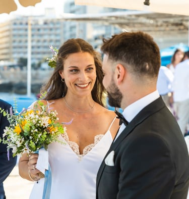 seaside wedding photoshoot, couple looking at eachother, seaside Malta