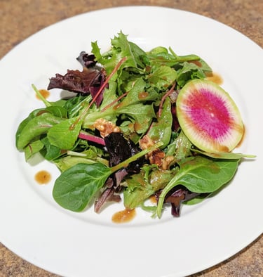baby greens salad with watermelon radish & balsalmic dressing. Portland gluten free dairy-free vegan