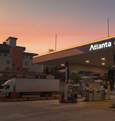 a gas station with a truck parked in front of it