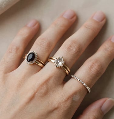 Close-up of a delicate gold ring with a sparkling diamond set against a soft beige background.