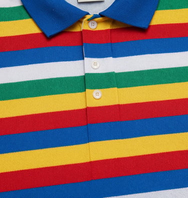 Close-up of a vibrant multi-colored striped polo shirt fabric texture.