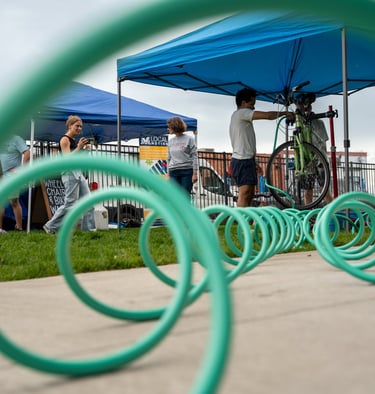 Close-up of the hose with the event in the background