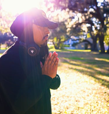 Cesar Pagan meditating within the trees
