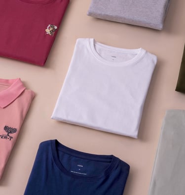 a variety of t - shirts and polo shirts