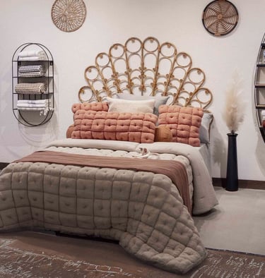 a bed with a large bed and a mirror