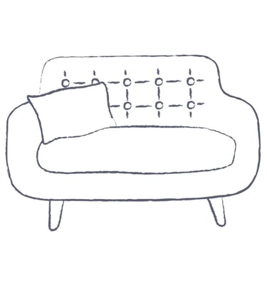 a wide and supportive couch with a comfortable pillow on it