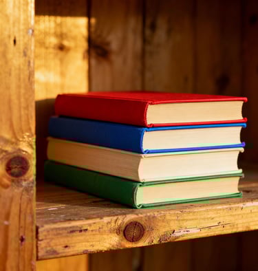 a stack of books on a shelf in a wooden shelf