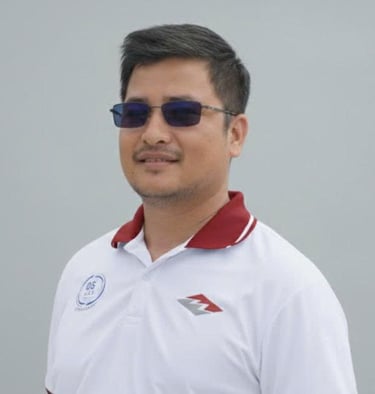 a man in a white shirt and sunglasses