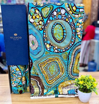 a notebook with a blue and yellow patterned cover