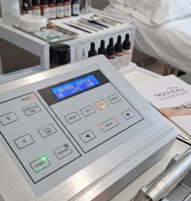 Professional Nouveau Contour permanent makeup machine and pigments in a sterile cosmetic tattoo clinic.
