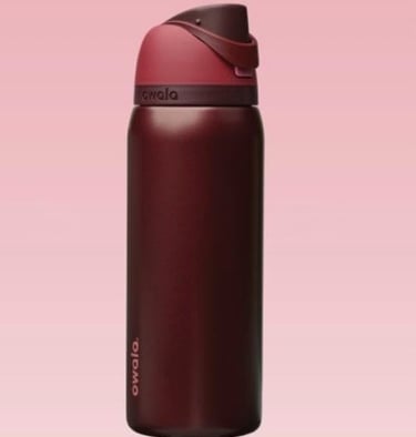 Owala FreeSip Insulated Stainless Steel Water Bottle in Maroon.