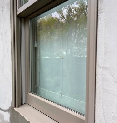 Spotless window after professional window cleaning in Clovis CA by Spartan Home Services