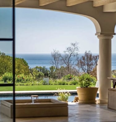 Covered terrace at Villa La Gratitud with sea views and al fresco dining