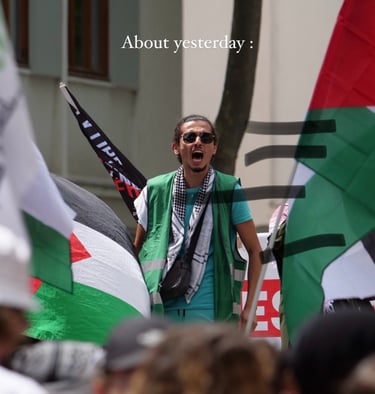 a man in a green vest and a scarf around his neck