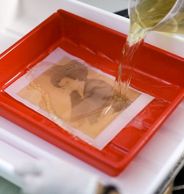 The print with the Platinum solution is revealed in our photographic workshop