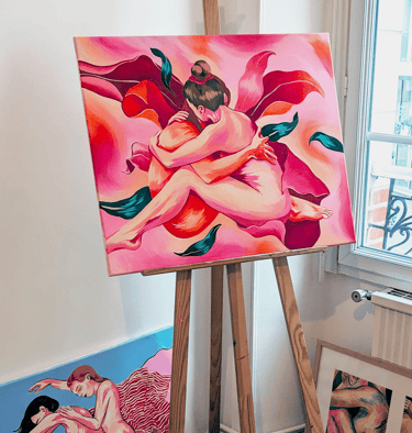 a painting of a woman sitting on a easel