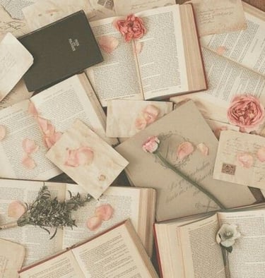 A photo showing several books and roses