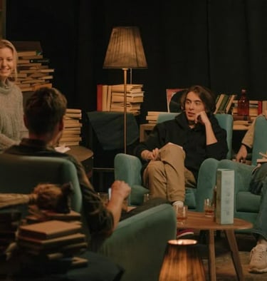 Photo of a group of people talking about books