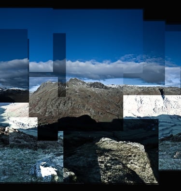 A joiner of the Lake District shot from the top of a snowy mountain