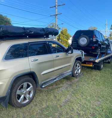 Tow truck removing an old car in Gold Coast