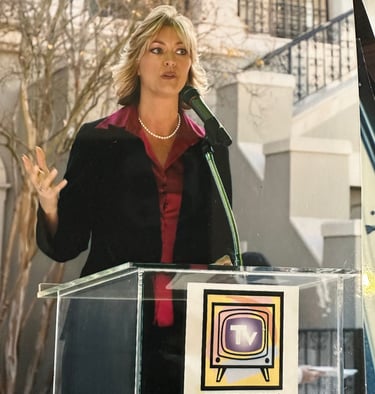 Angie Crouch speaking at Luncheon