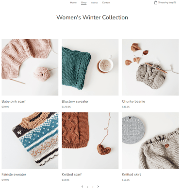 A collection of handmade knitwear including sweaters, scarves, and beanies for a women's winter clothing shop.