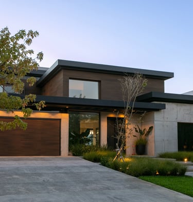 a house with a driveway and driveway with a driveway