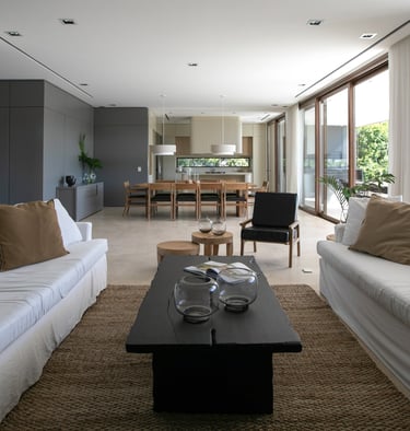 a living room with a couch and a table