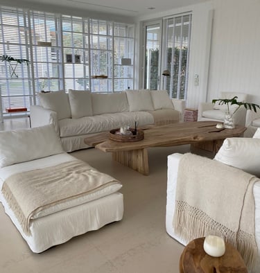 a living room with a couch and a table