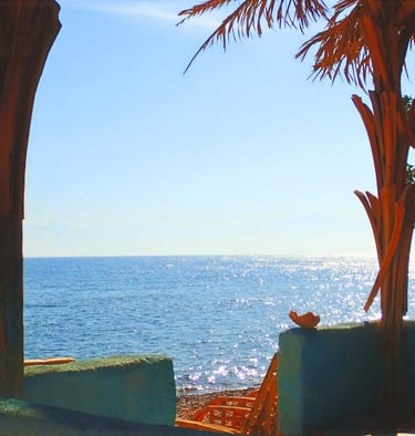 Watching the sea from our popular bungalow with shared bathroom first line