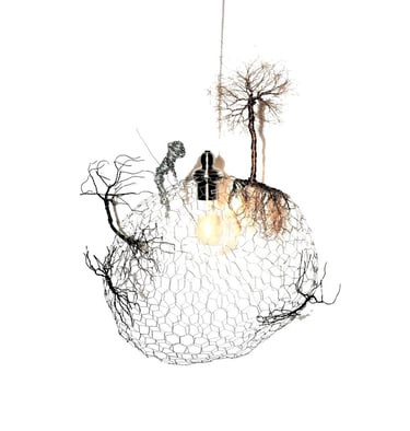 Lustre l'homme qui plantait des arbres sculpture de Wilfrid Bricourt