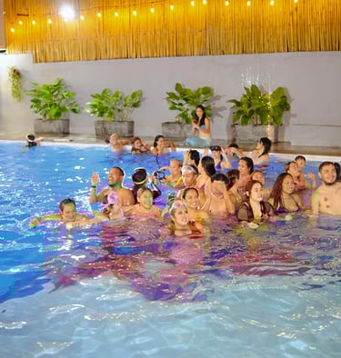 mermaids swimming together in pool during MerEvent