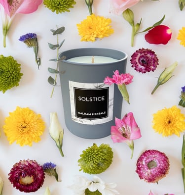 Luxury essential oil candle decorated with flowers.