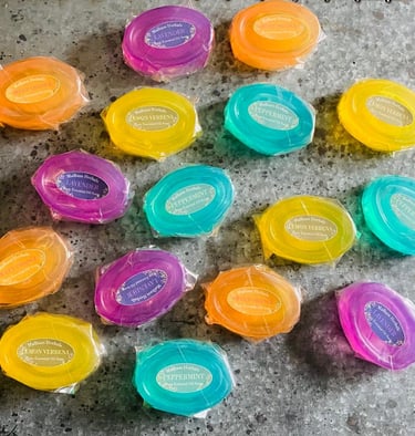 Colourful essential oil soaps with plastic-free wrapping