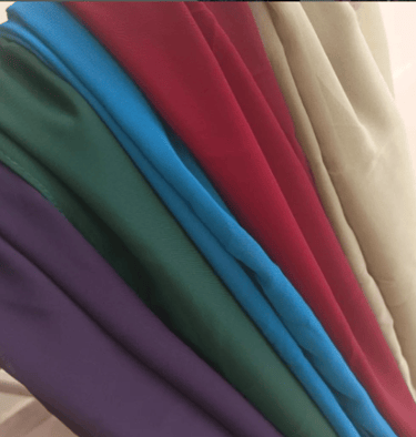 a bunch of different colored fabrics and fabrics stoler