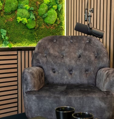 a chair with a mossel planter on it