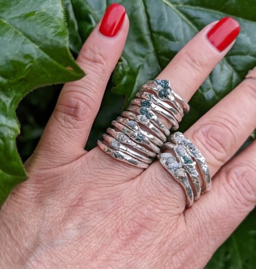 Lagoon rings incorporating raw diamonds
