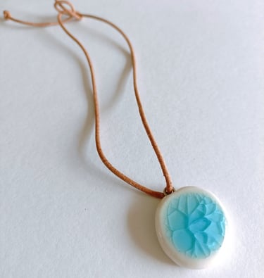 The Eden Holistic Health Studio, Gift Shop, Porcelain and Leather Thong, Turquoise Pendant.