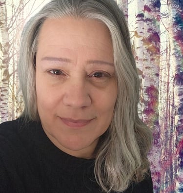 Headshot of Melanie West, owner and designer of Mel's Goods.