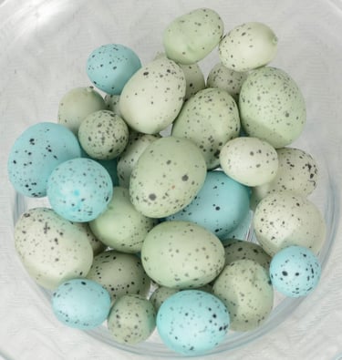Faux speckled eggs in blue and green