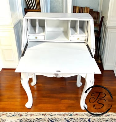 opened secretary desk cream