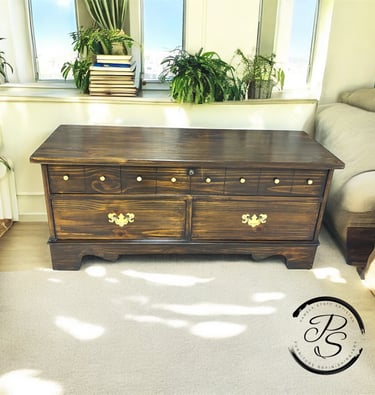walnut stain chest with gold hardware